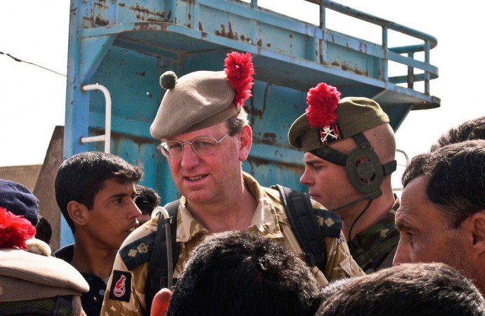 Colonel dons a tam-o’-shanter and leads his troops on a friendly foray into town